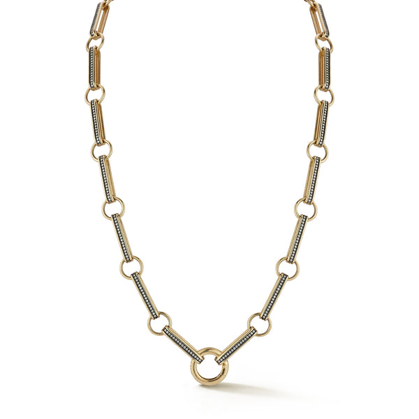 14K Gold Elongated Book Link 16" Diamond Ellis Chain
A Storrow classic, reimagined. This chain showcases elongated book links with a pave diamonds and a sleek rhodium finish that enhances every sparkle. Designed with a push center bail, it’s effortless to personalize with charms or pendants, making it the ultimate versatile chain for layering or everyday wear.