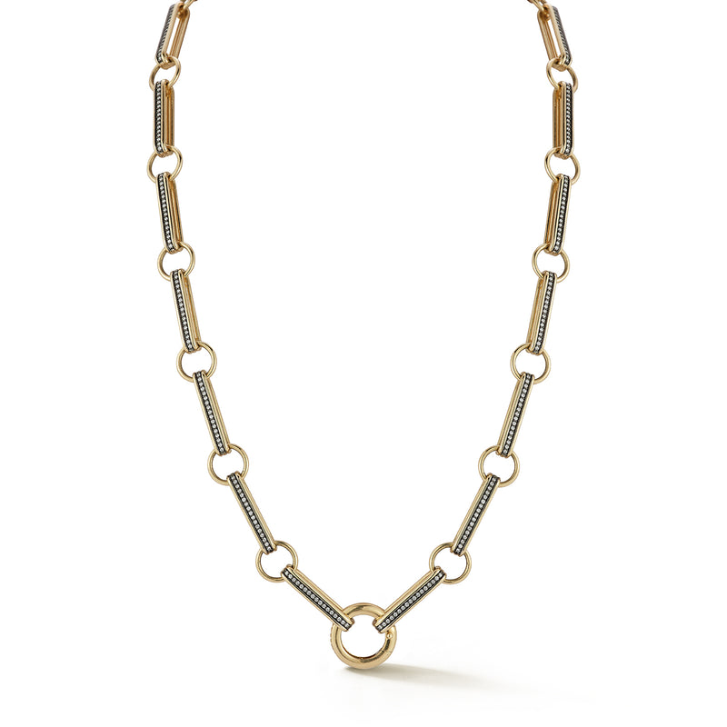 14K Gold Elongated Book Link 16" Diamond Ellis Chain
A Storrow classic, reimagined. This chain showcases elongated book links with a pave diamonds and a sleek rhodium finish that enhances every sparkle. Designed with a push center bail, it’s effortless to personalize with charms or pendants, making it the ultimate versatile chain for layering or everyday wear.