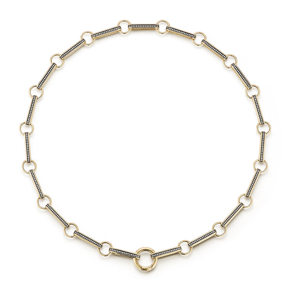 14K Gold Elongated Book Link 16" Diamond Ellis Chain
A Storrow classic, reimagined. This chain showcases elongated book links with a pave diamonds and a sleek rhodium finish that enhances every sparkle. Designed with a push center bail, it’s effortless to personalize with charms or pendants, making it the ultimate versatile chain for layering or everyday wear.