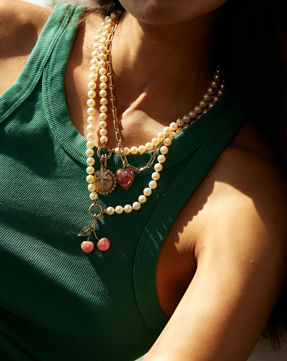 Storrow offers one-of-a-kind fine jewelry gifts to impress that special someone in your life. Our pieces are inspired by the modern day collector, and curated for the everyday wearer. Storrow's charms & medallions are designed to be mixed and matched with our custom chains using our open-clip bail. Style yours today! Shop our best-selling Rhodochrosite Cherry Charm (Blake Lively's favorite!) and Pink Quartz Anna Charm.